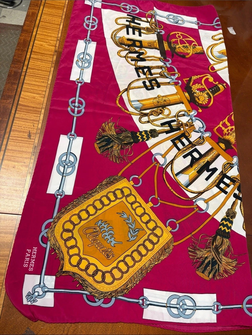 Hermes Carre 90’s silk scarf featuring the iconic “Cliquetis” design